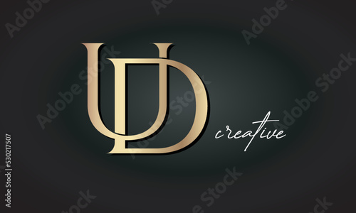 UD letters luxury jewellery fashion brand monogram, creative premium stylish golden logo icon photo