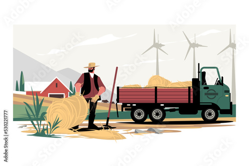 Man farmer getting round bales of hay in truck