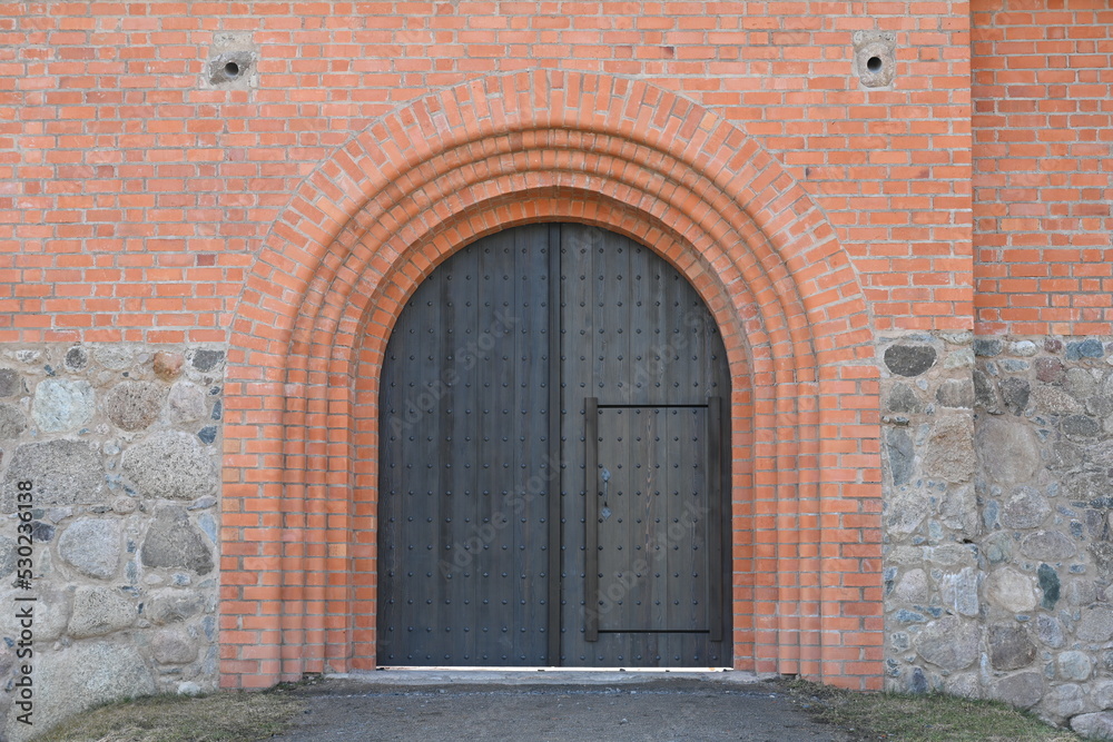 Doors in a brick wall in an old building Doors in a brick wall in an old building