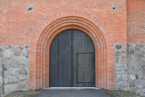 Doors in a brick wall in an old building