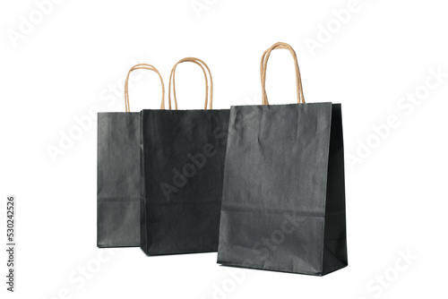Black paper bags isolated on white background