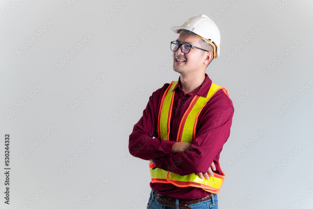 Portrait of happy young foreman with hard hat in a studio. Architect, Engineer, Civil Concept of Construction. Portrait of happy young foreman with hard hat in a studio. Architect, Engineer, Civil Concept of Construction.
