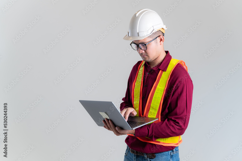 Architects, civil engineers, engineers working on laptops in a studio. Architect, Engineer, Civil Concept of Construction. Architects, civil engineers, engineers working on laptops in a studio. Architect, Engineer, Civil Concept of Construction.