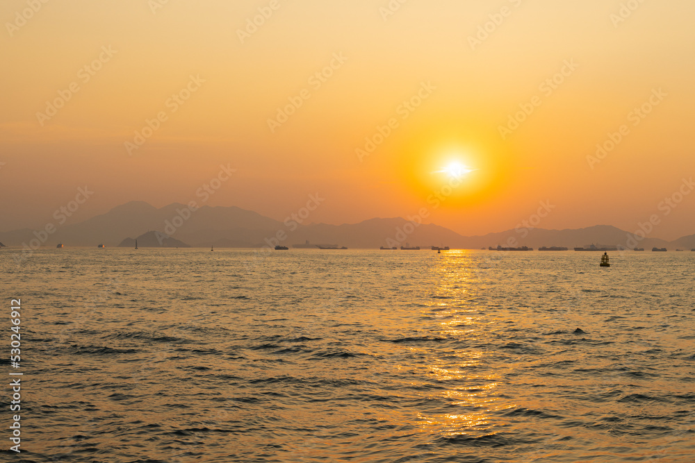 sunset in West Kowloon Waterfront Promenade, Hong Kong in evening