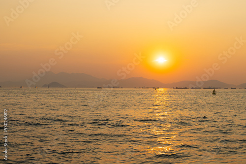 sunset in West Kowloon Waterfront Promenade, Hong Kong in evening © James Jiao