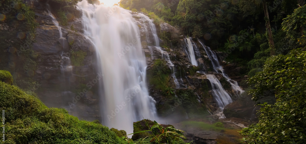 The jungle with a Waterfall-River-rocks-covered-with rainy forest-Waterfall in the forest at park The jungle with a Waterfall-River-rocks-covered-with rainy forest-Waterfall in the forest at park