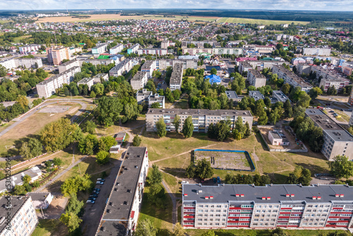 aerial panoramic view from a great height of a small provincial town with a private sector and high-rise apartment buildings © hiv360