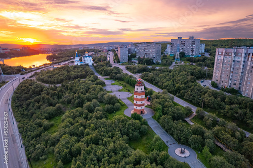 Murmansk, Russia - July 16, 2022: Aerial view panorama of city memorial Lighthouse northern city sunset photo