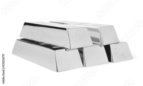 Stack of shining silver bars isolated on white