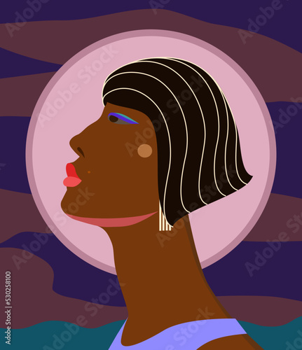 Beautiful black woman. Young african american. Portrait of young woman with beautiful face and hair. Side view. Isolated on night background.