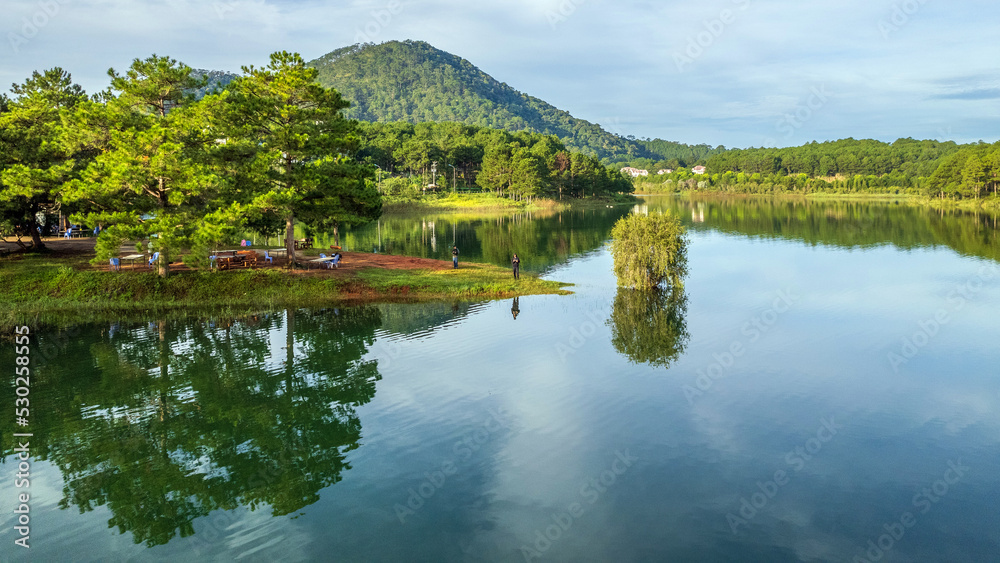 The lake and mountains magical view in Da Lat, Vietnam