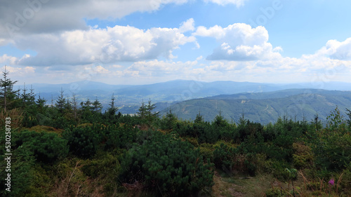 Fototapeta Naklejka Na Ścianę i Meble -  Mountain landscape. Silesian Beskids. One of the Beskids mountain ranges in Outer Western Carpathians in southern Silesian Voivodeship, Poland. Tatras peaks silhouettes in the distance