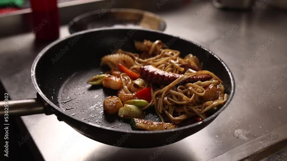 Noodles with seafood and vegetables in a Japanese restaurant
Noodles with seafood and vegetables in a Japanese restaurant