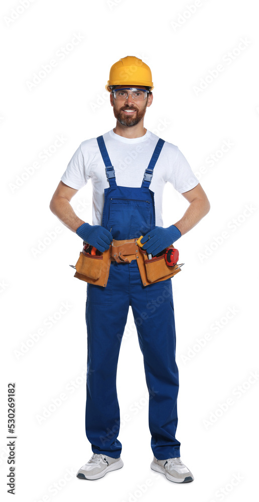 Professional builder in uniform with tool belt isolated on white