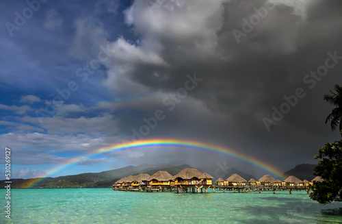 Rain shower creating Multicolored rainbow Bora Bora Resort