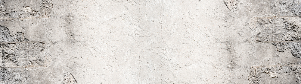 Old aged damaged cracked grunge white grey gray concrete cement plaster facade wall texture background banner long pattern Old aged damaged cracked grunge white grey gray concrete cement plaster facade wall texture background banner long pattern