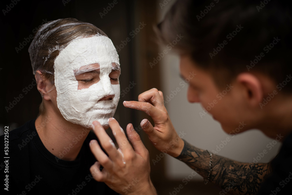 The process of making a plaster mask at home. creating masks based on a  plaster cast. Gypsum mold. Cast of the face. Sculpting. The workflow of the  artist. Stock Photo | Adobe