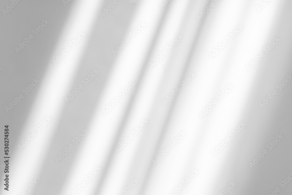 Abstract white studio background for product presentation. Wall with shadows of window. Display product with blurred backdrop. Abstract white studio background for product presentation. Wall with shadows of window. Display product with blurred backdrop.