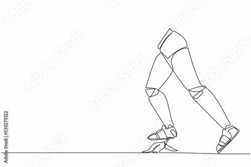 Fotografie Continuous one line drawing of unlucky robot leg step on banana peel
