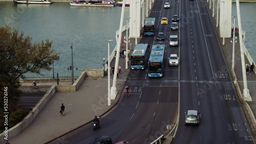 Zoomed In Shot Of Traffic Travelling Over The Elizabeth Bridge In Both Directions In Budapest
