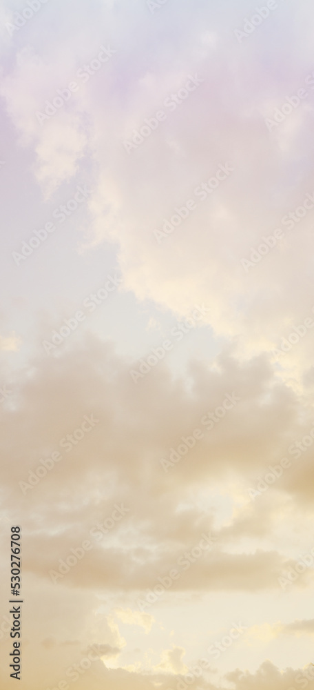 Obraz premium Fantastic pastel-colored sky with gradient. Beautiful fluffy clouds in the sky.
