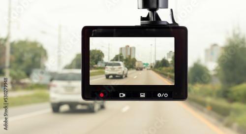 Car CCTV camera video recorder for driving safety on the road photo