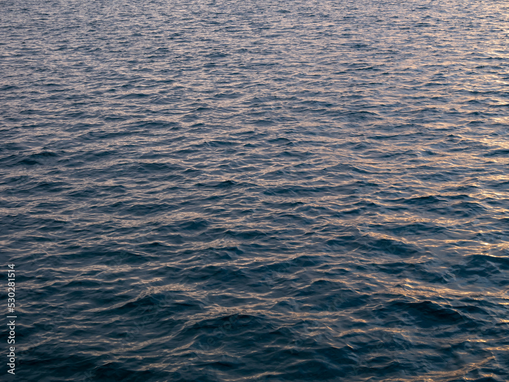 Small waves on the Mediterranean sea. Textured background
Small waves on the Mediterranean sea. Textured background