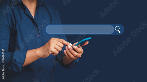 Close-up of hands businessman using a smartphone to search for information on the internet