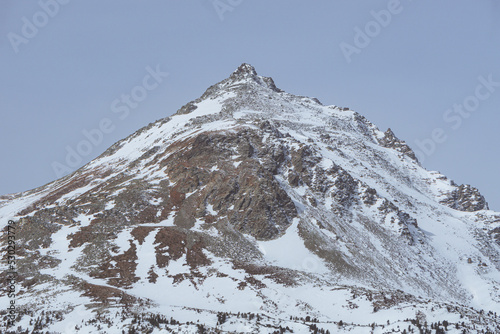 The snowy mountain of the Engadin, near the town of Sankt Moritz, Switzerland - March 2022