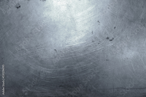 Stainless steel with scratches background texture.
