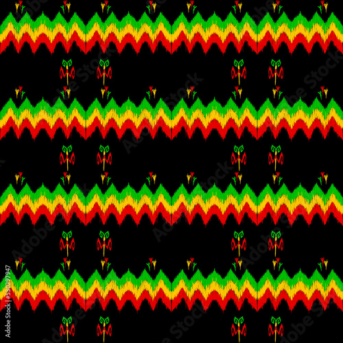 ikat pattern design.seamless pattern folklore mexican rasta regge style. design for fabric   wallpaper  clothing