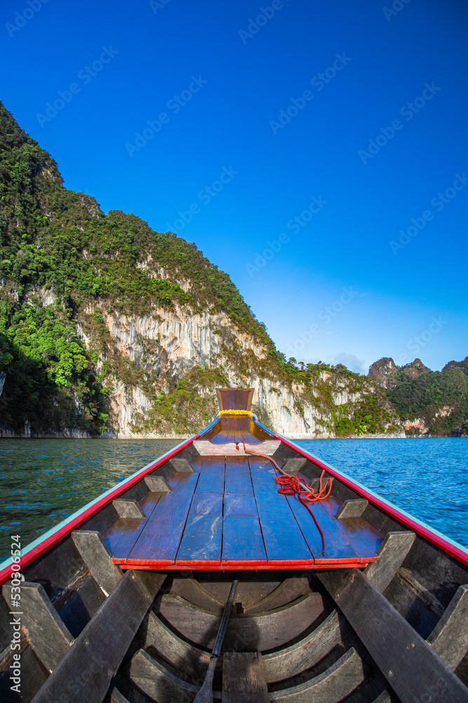Long Tail boat on Khao Sok national park Cheow Lan Dam lake in Surat Thani, Thailand