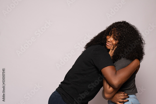 african lady supports and consoles her friend © Confidence