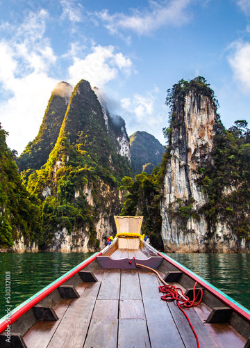 Long Tail boat on Khao Sok national park Cheow Lan Dam lake in Surat Thani, Thailand © pierrick