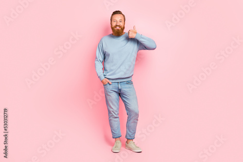 Full body photo of positive nice man hand finger demonstrate thumb up isolated on pink color background © deagreez