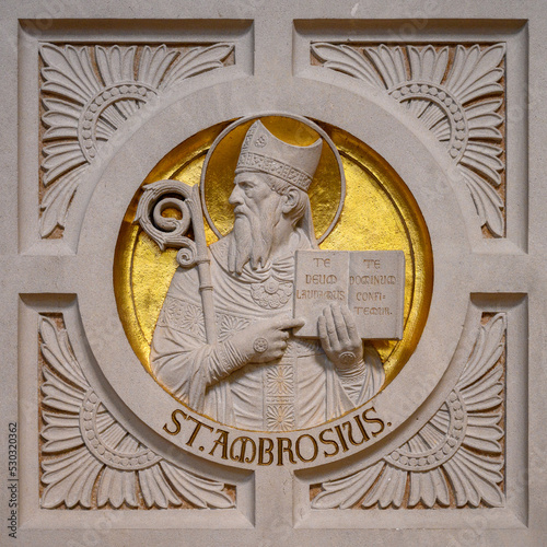 Saint Ambrose. Relief on the pulpit in the Church of Saints Cosmas & Damian in Clervaux, Luxembourg. 2021/07/10. photo