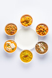 Group of Indian vegetarian dishes, hot and spicy Punjabi cuisine meal assortment in bowls
