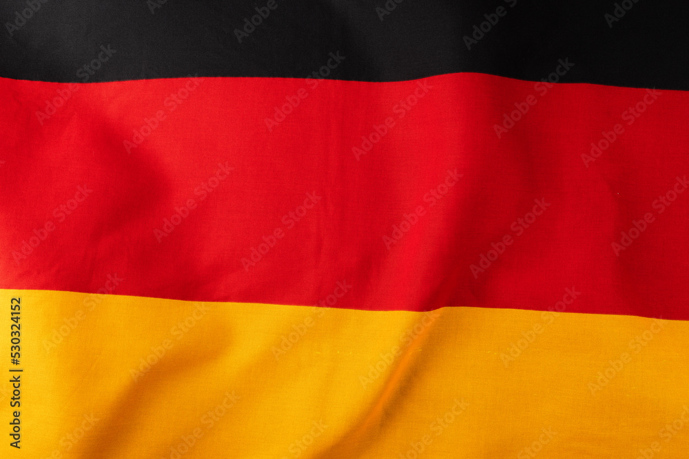 Image of close up of wrinkled national flag of germany