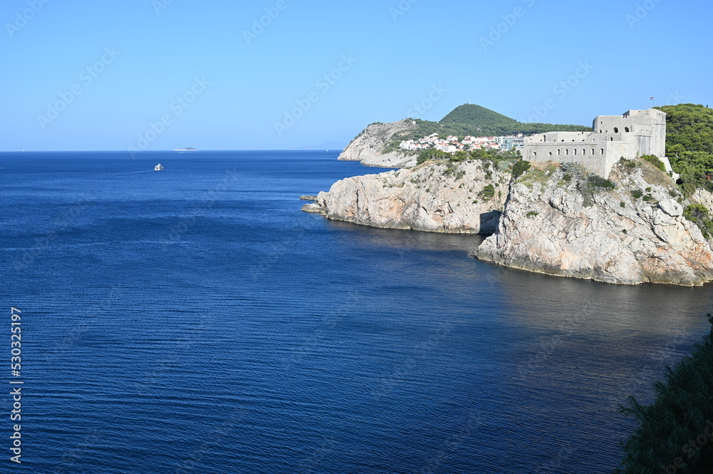The rooftops and walls of the old walled town of Dubrovnik. The rooftops and walls of the old walled town of Dubrovnik.