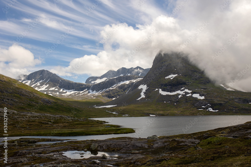 Fototapeta premium Family, visiting the famous Trollstigen road in Norway