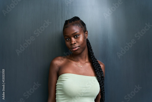 Modern black braided model in casual outfit photo