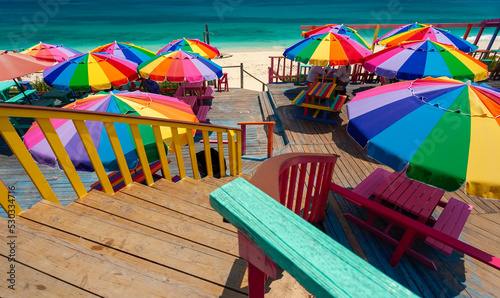 Umbrellas in the sun tropical beach Bahamas Caribbean © Spotmatik