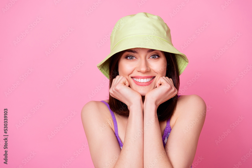 Portrait of carefree satisfied person arms touch cheekbones toothy beaming smile isolated on pink color background Portrait of carefree satisfied person arms touch cheekbones toothy beaming smile isolated on pink color background