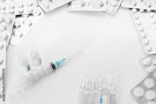 Medications and infection to prevent a pandemic virus. Pills, masks on white isolated background. Flat lay Top view with copy space for your text.