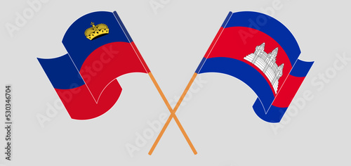 Crossed and waving flags of Liechtenstein and Cambodia