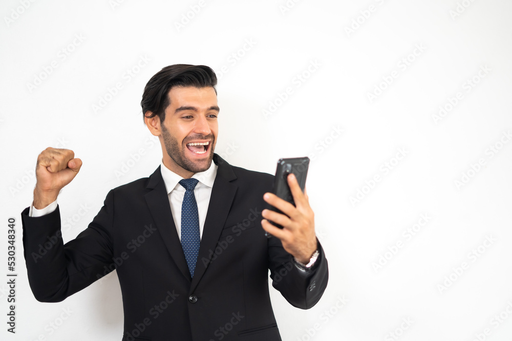 Businessman using smartphone feel happy success and win Businessman using smartphone feel happy success and win