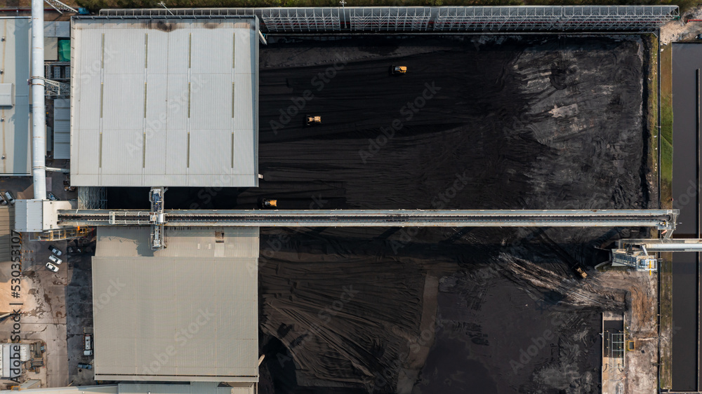 Aerial top view moving belt with heap of coal next to the coal power plant, Coal mining view from above, Aerial top view moving belt with heap of coal next to the coal power plant, Coal mining view from above,