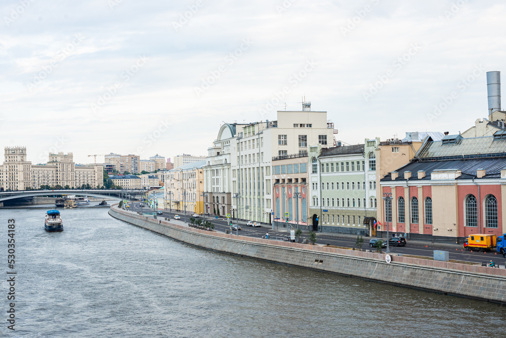 Moscow river with pleasure boats, embankment view, city view, architecture of Moscow