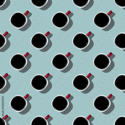 Seamless pattern. Red cup of coffee on a blue background, top view