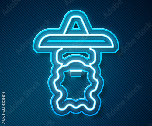 Glowing neon line Wizard warlock icon isolated on blue background. Vector